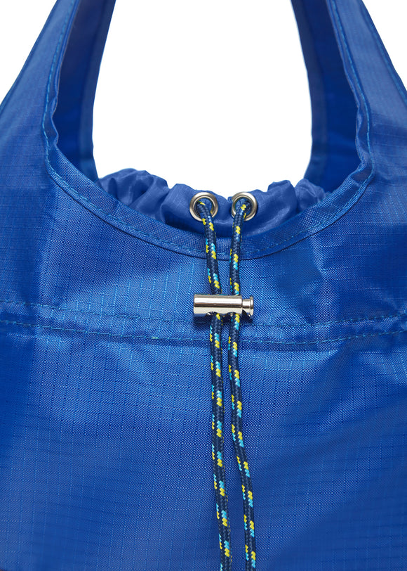 Drawstring of blue travel bag
