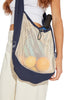 girl wearing net bag across their body and hanging at their waist