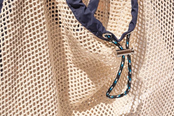 close up of drawstring of net bag