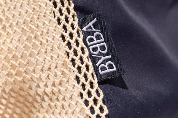 close up of BYBBA label on net bag