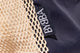 close up of BYBBA label on net bag