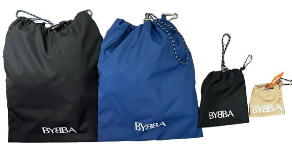 four pouches. two large in black and blue.  A small black pouch and smaller pale pouch