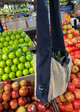 net bag hanging at a produce section of a store
