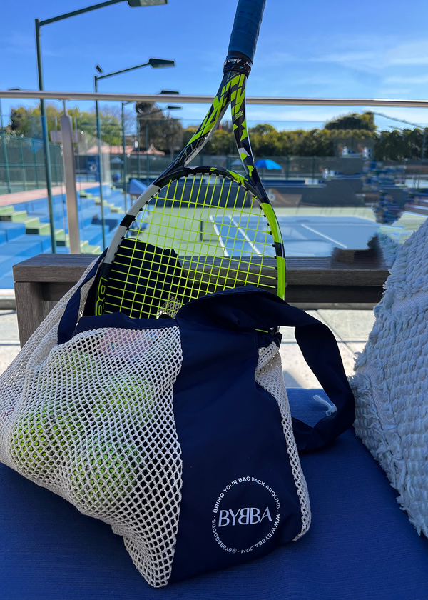 Net bag at a court with a racquet
