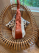 net bag in a chair displaying it's rust sides