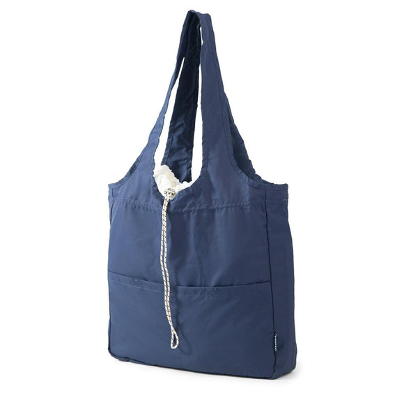 angled view of navy bag with pocket