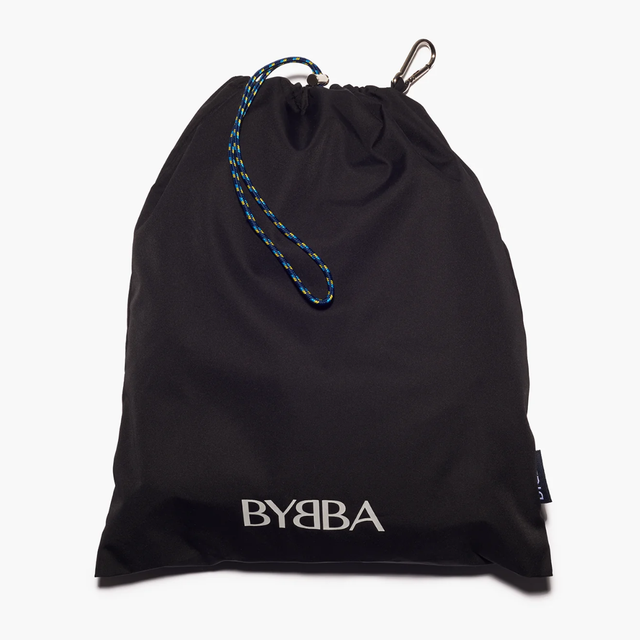 Black BYBBA packable, foldable, reusable bag made from recycled ocean plastic with blue-yellow drawstring