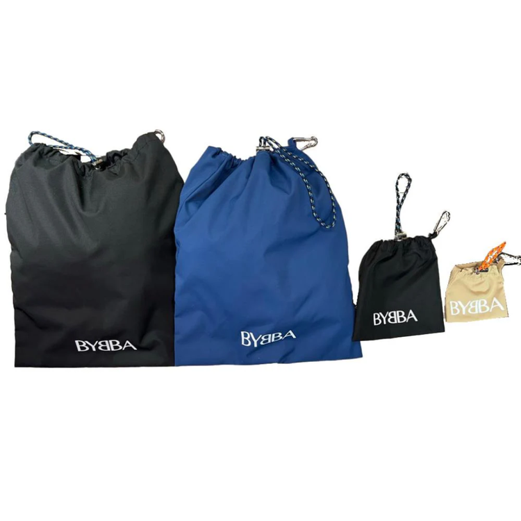 Packable, foldable, reusable bags made from recycled ocean plastic by BYBBA, available in black, blue, and beige.