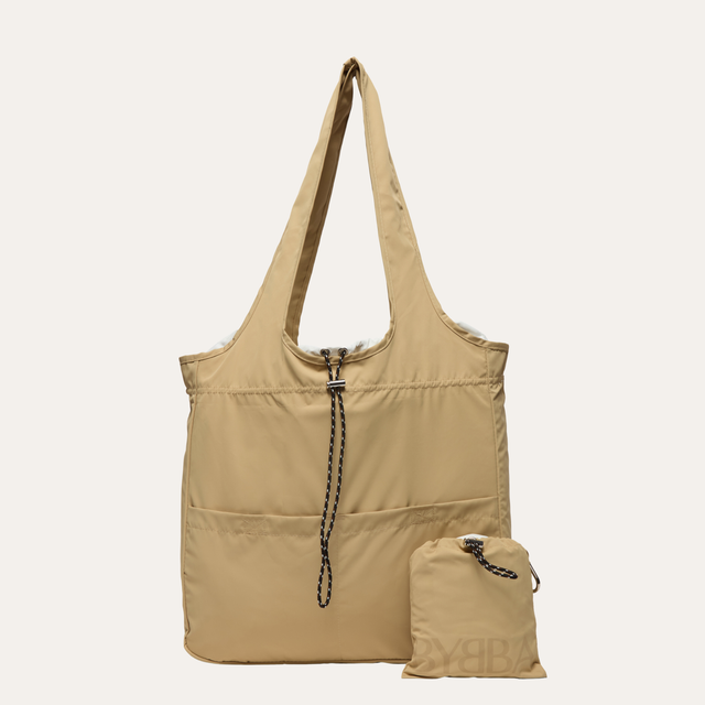 Beige tote bag with a smaller matching pouch on a white background