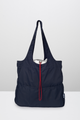 Navy blue tote bag with red drawstring closure